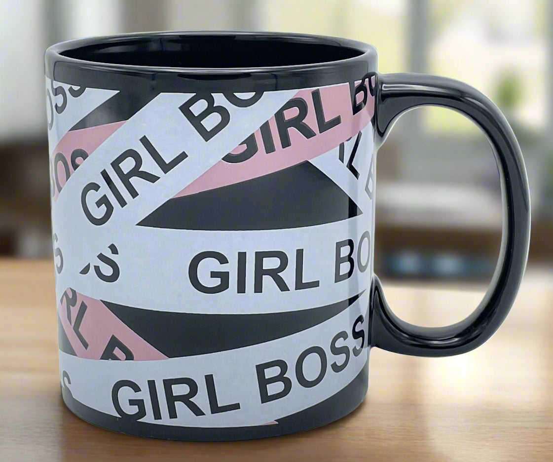 Mug with 'Girl Boss' text design on a blurred background