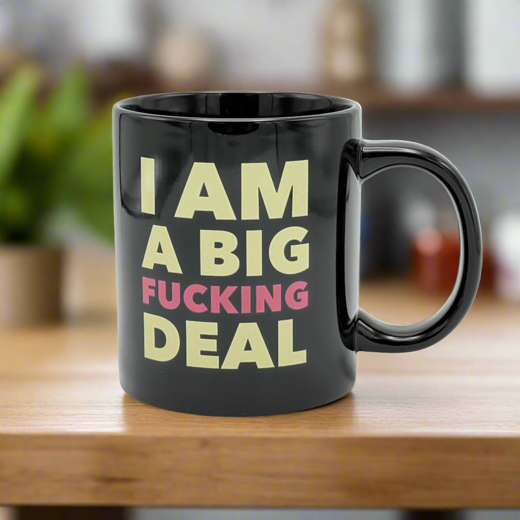 giant ceramic mug with text that reads I Am a Big Fucking Deal